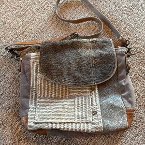 Myra Bag crossbody tan cotton bag simulated animal hair on flap in front of bag